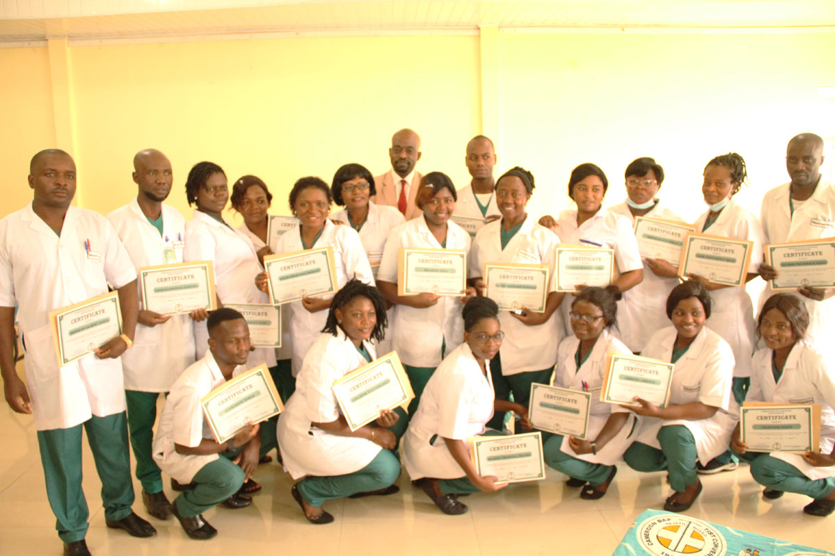 Cameroonian nursing school graduates holding certificates